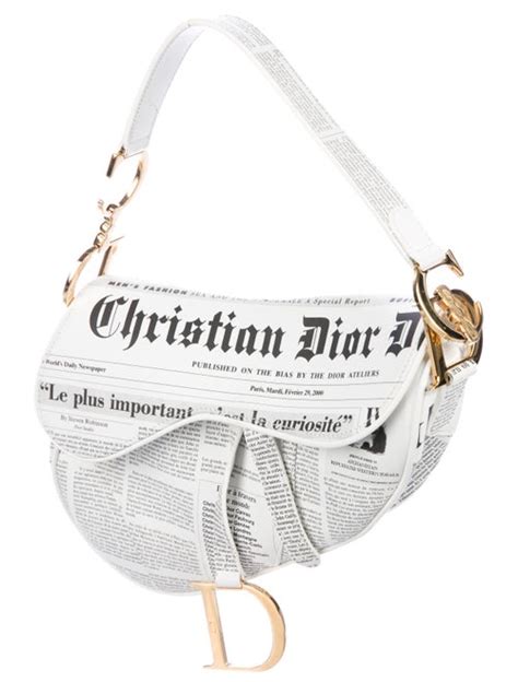 dior newspaper saddle bag